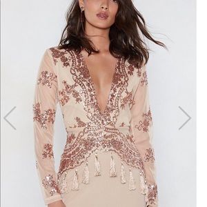 Sexy low-cut party dress with rose-gold sequins.